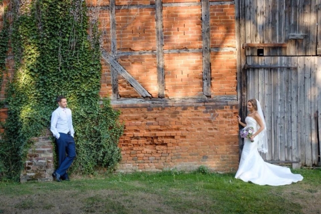 bride and groom staring