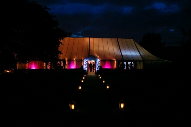 Ceremony in Marquee shot from outside wedding venue essex