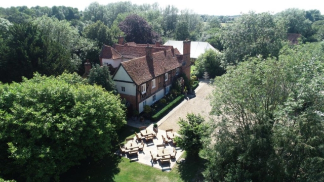 Close up Drone shot of main building wedding venue essex