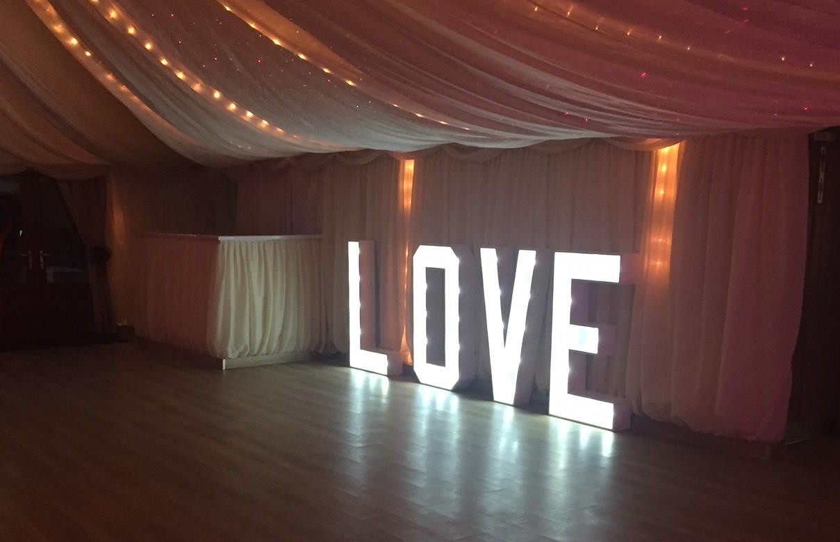 Individual Bulb Love decorative sign at wedding venue essex