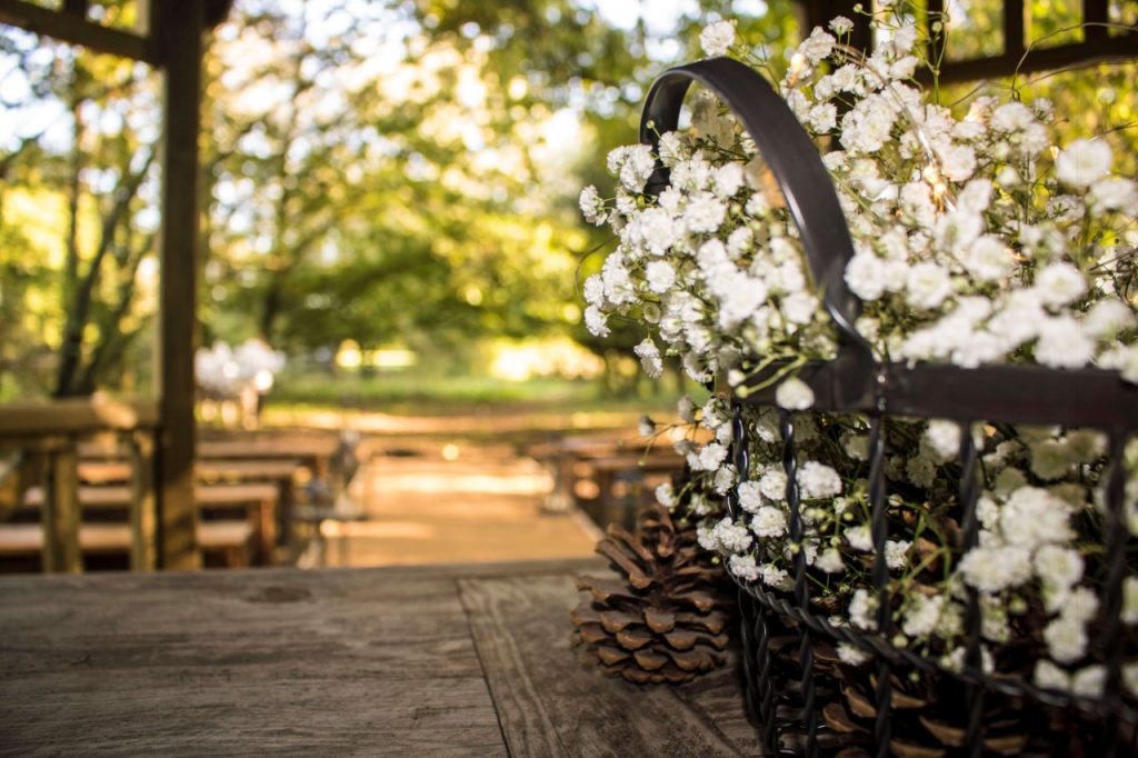 White flowers in wire basket