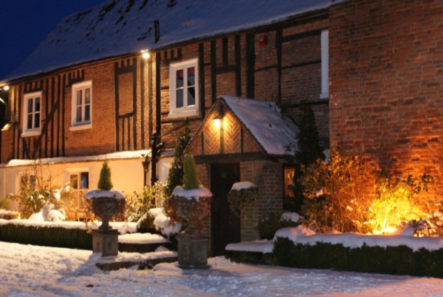 Newland Hall main building covered with snow wedding venue essex