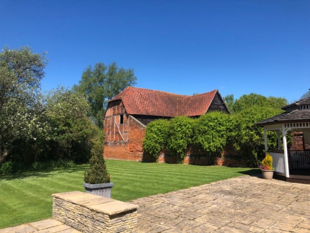 Old barn by Gazebo at wedding venue essex