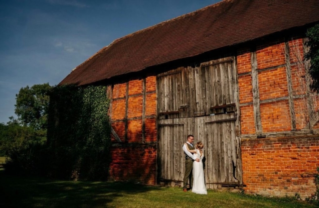 Bride and Groom outside of Barn Doors