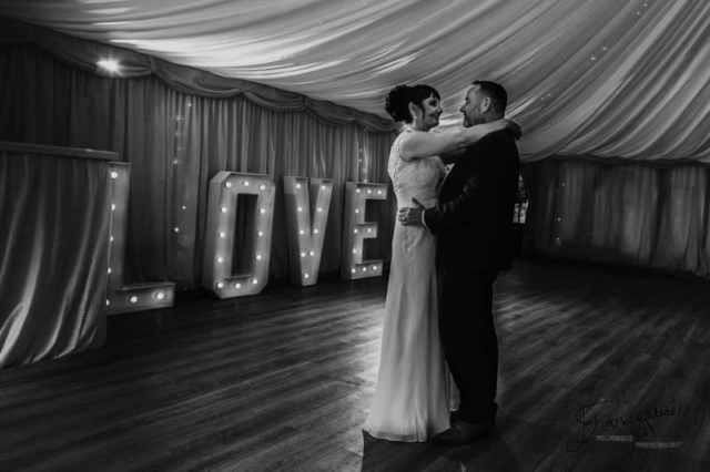 Newlyweds dancing at Newland Hall