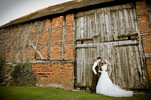 bride and groom barn