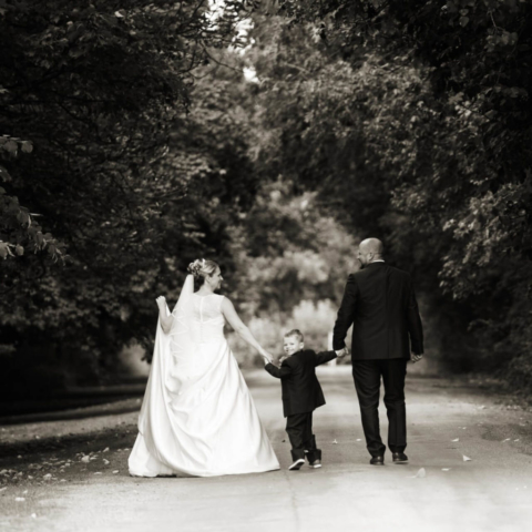 bride, groom and son